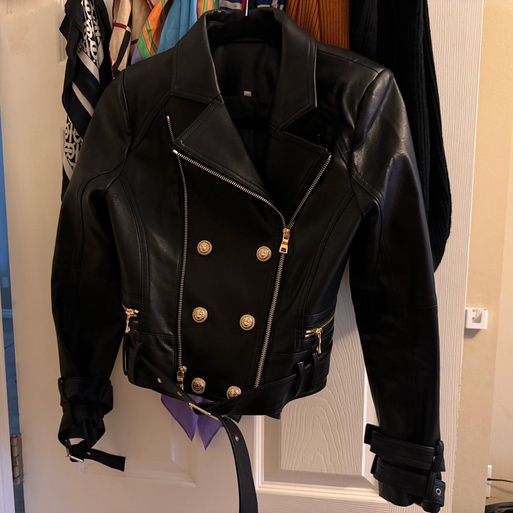 Like new black leather jacket no brand was purchased at a local shop in Europe